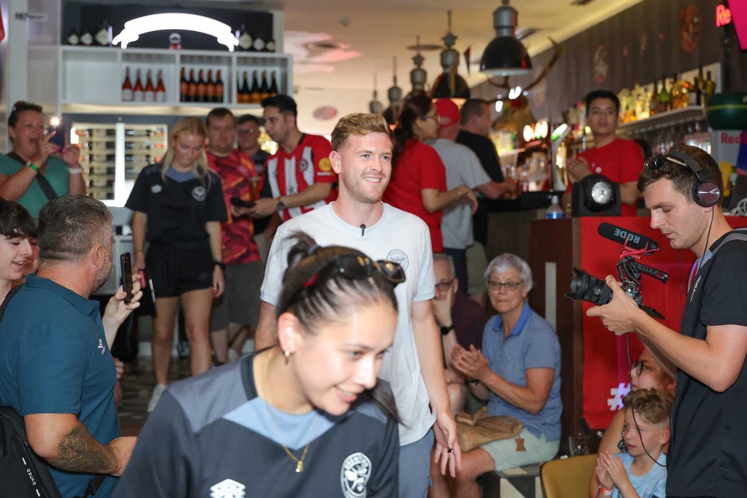 Football fans and supporters gathered inside The Spot Lisboa